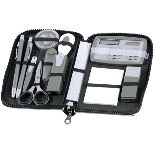 A grey Oxford Stationery Set in a zippered case, featuring pens, scissors, a calculator, and notepads.