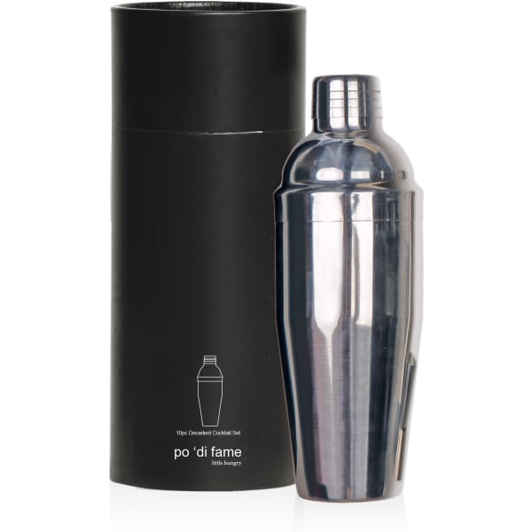 A sleek silver cocktail shaker beside a black cylindrical box, part of the Decadent Cocktail 10 pcs Set.