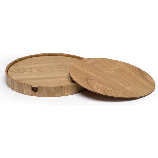 A wooden placemat set in light brown tones, featuring a circular design and a smooth finish.