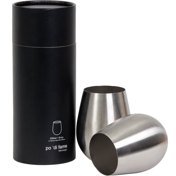 A set of two stemless stainless steel wine glasses in a black cylindrical box. The glasses are shiny silver.