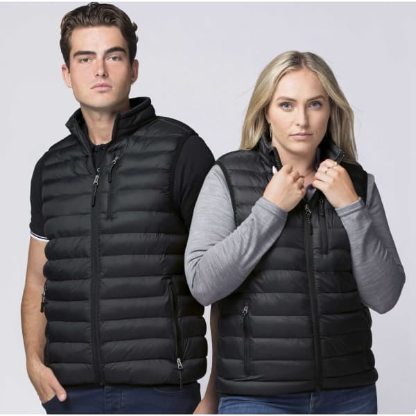 Two models wear black padded vests, displaying a sleek design with zippered pockets and a logo on the front.