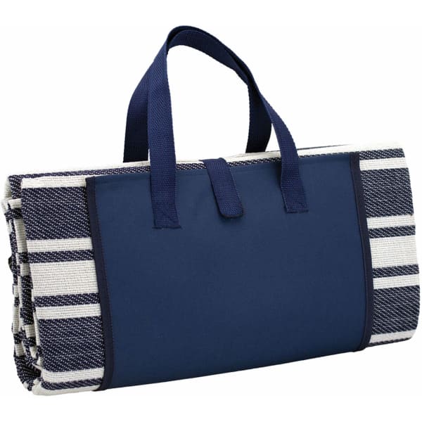 A navy and cream striped picnic rug, neatly folded with handles for easy carrying, features a branding logo.