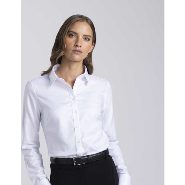 A white button-up shirt for women with a collar, featuring a subtle sheen and a fitted silhouette.