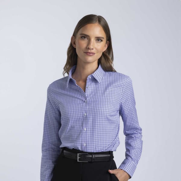 A women's button-up shirt in blue and white check pattern, featuring a collar and long sleeves. It has a branding logo.