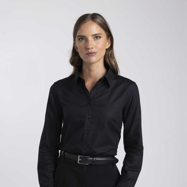 A black button-up shirt for women with a collar and long sleeves, featuring a subtle logo.