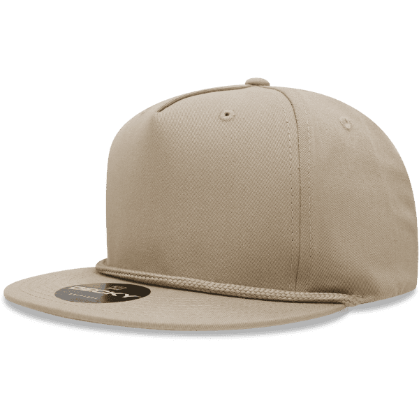 A beige 5 panel high pro cotton/poly blend snapback cap with a round logo on the side.