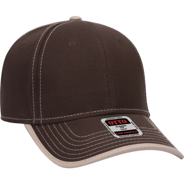 A brown 6-panel baseball cap with a contrasting cream-coloured brim and a logo on the front.