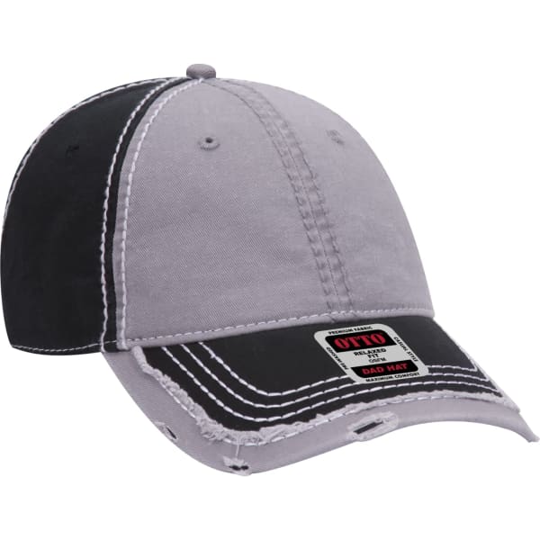A grey and black 6-panel dad hat with distressed detailing and a logo on the front.