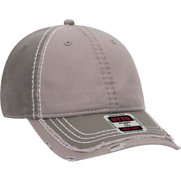 A beige 6 panel dad hat with contrasting stitching and a logo tag on the front.