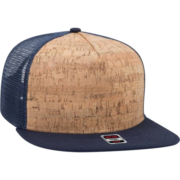 A cork and navy blue trucker cap with a mesh back and a branded label on the front.
