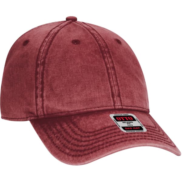 A red 6 panel dad hat featuring a logo, with a curved brim and a classic design.