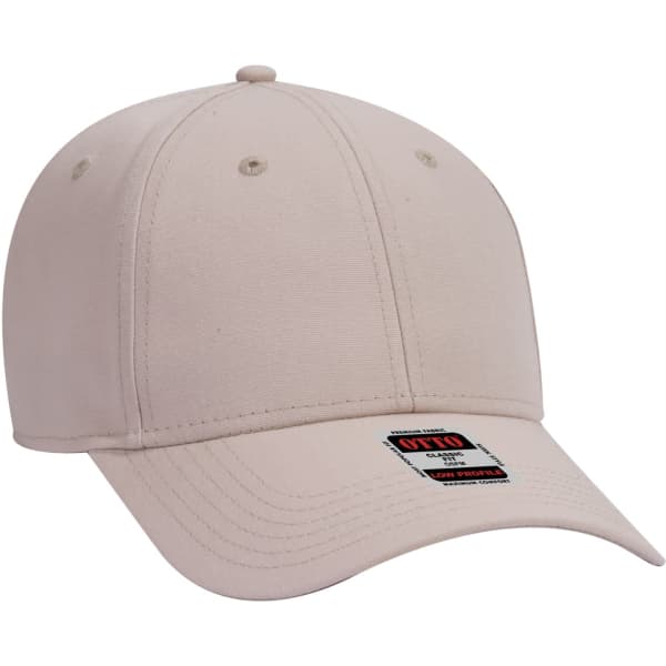 A beige 6 panel baseball cap with a logo on the front and curved brim.