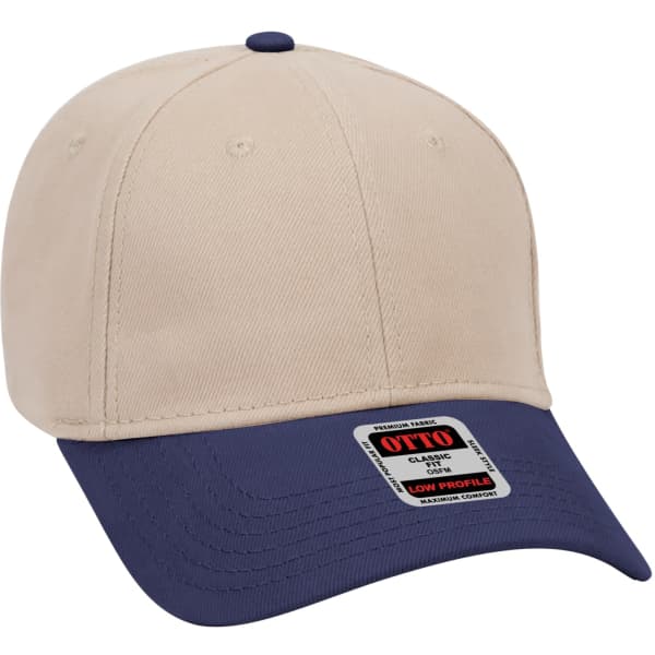A beige and navy blue 6-panel baseball cap featuring a low-profile design and a logo on the front.