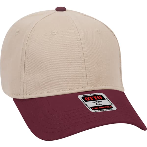 A 6 panel baseball cap featuring a beige body and maroon brim, with a brand logo on the side.