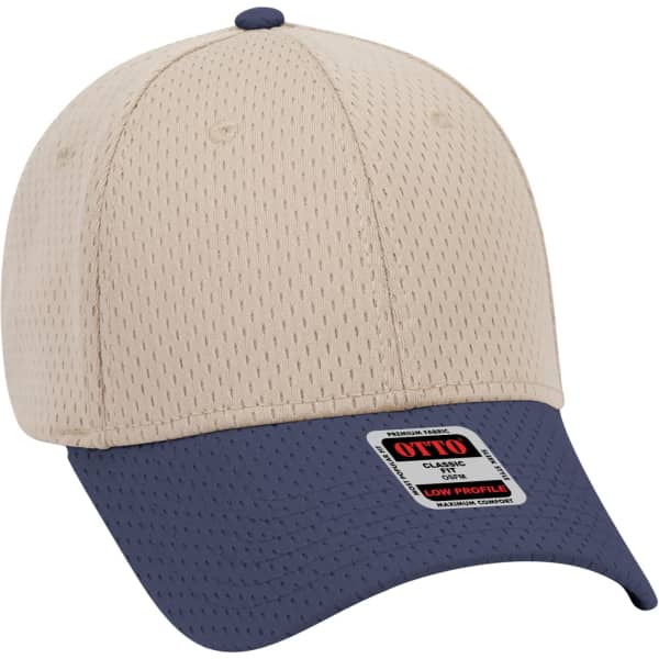 A beige and navy 6 panel baseball cap with a logo on the front. The fabric features a perforated design.
