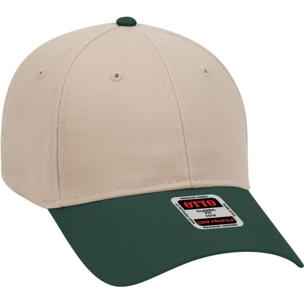 A beige 6-panel baseball cap with a dark green peak and a logo sticker on the brim.