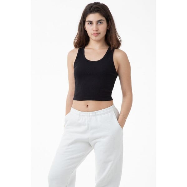 A black 2x1 rib crop tank top paired with white sweatpants, featuring a logo.