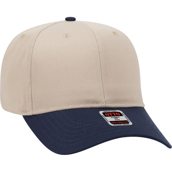 A beige 6-panel baseball cap with a navy blue brim and a logo on the front.
