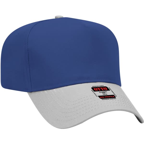 A blue 5-panel baseball cap with a grey peak, featuring a branding label on the side.