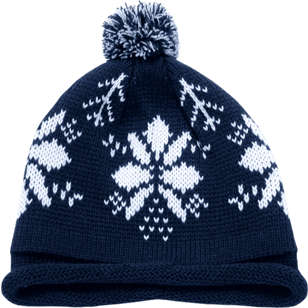 A navy beanie with a white snowflake pattern and a pompom on top, featuring a folded brim.