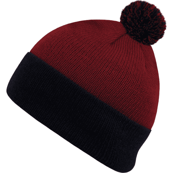 A red and navy knit beanie with a pom pom on top and a folded cuff. It features a logo.