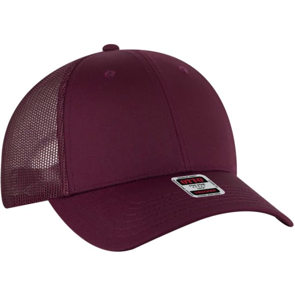 A burgundy 6 panel trucker hat featuring a mesh back and a branded label on the front.