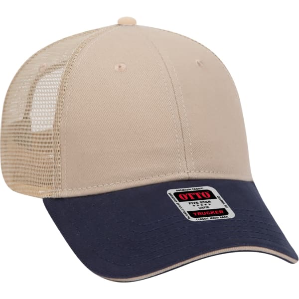 A beige six-panel trucker hat with a navy blue peak and a mesh back, featuring a logo on the front.