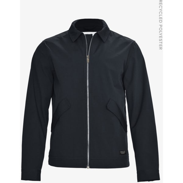 A unisex jacket in navy blue featuring a zip front and side pockets, made from recycled polyester.