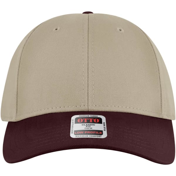 A 6 panel low profile baseball cap in beige with a burgundy peak, featuring a logo on the front.