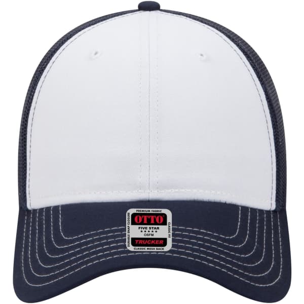 A low profile trucker cap featuring a white front and navy mesh back, with a logo tag sewen on the brim.