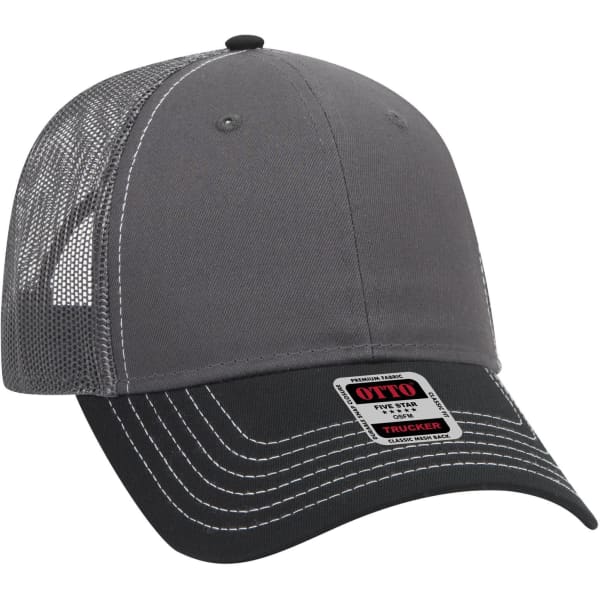 A grey and black six-panel low profile trucker cap with a mesh back and a logo tag on the front.