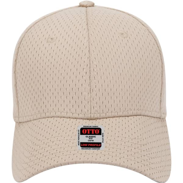 A beige 6-panel low profile baseball cap with ventilation holes and a logo on the front.