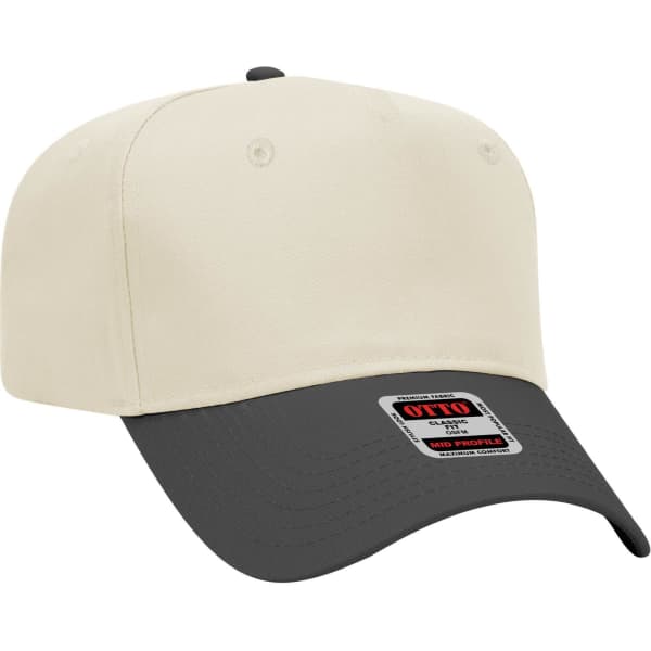 A 5 panel mid crown baseball cap featuring a cream front and a dark grey peak, with a logo on the front.