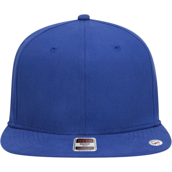 A blue 6 panel mid profile snapback cap with a branded tag at the front.