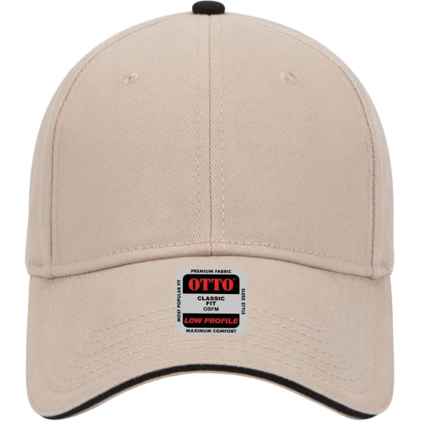 A low profile baseball cap in beige with a black brim and a logo on the front.
