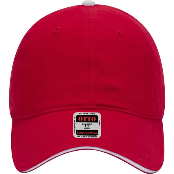 A red low profile baseball cap with a logo, featuring a rounded crown and a curved peak.