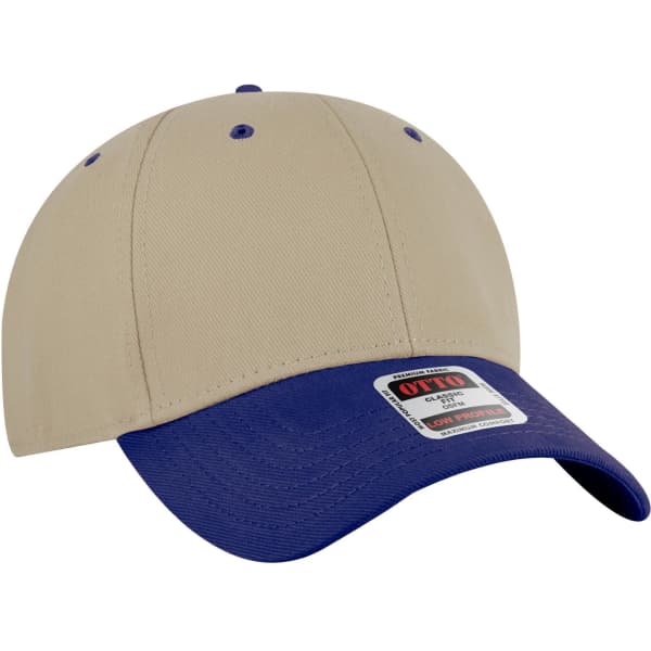 A beige and navy blue six-panel low profile baseball cap with a logo on the front.