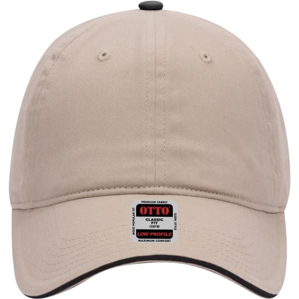A low profile baseball cap in beige with a logo and a black underbrim.