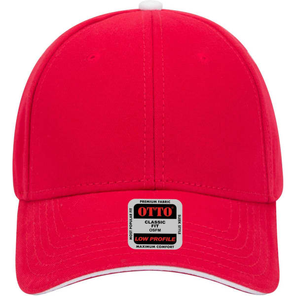 A red 6-panel low profile baseball cap featuring a branded tag. The cap has a smooth fabric finish.