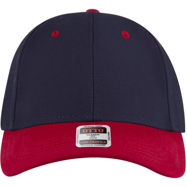 A navy and red 6 panel low profile baseball cap with a sticker label and a logo on the front.