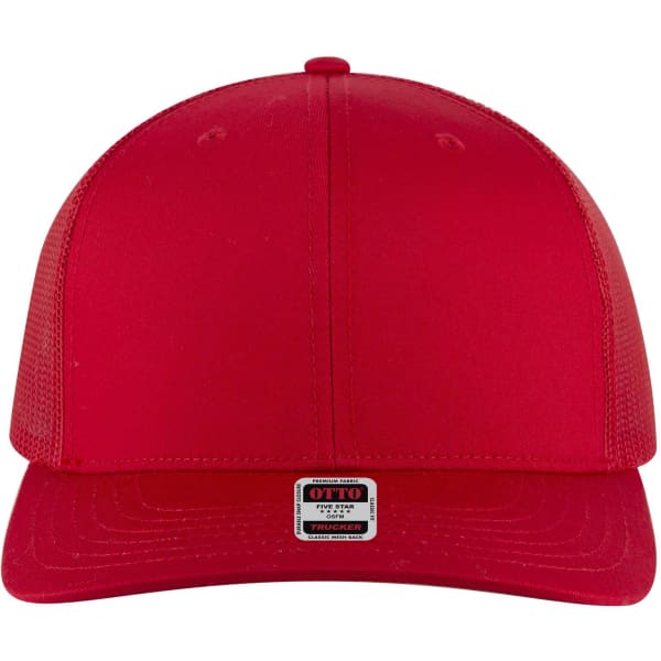 A red 6 panel mid-profile trucker cap with mesh sides and a branded label on the front.