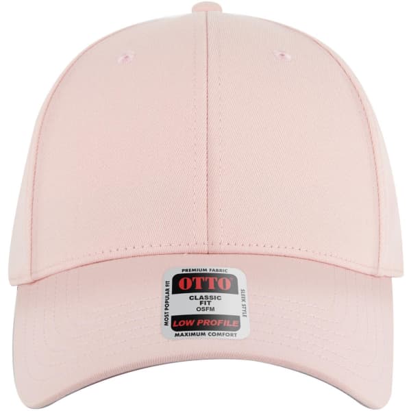 A pink 6 panel low profile baseball cap with a branded tag at the front.