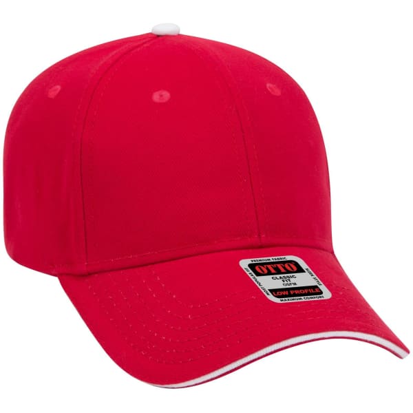 A red 6 panel low profile baseball cap with a white accent and a branding label.