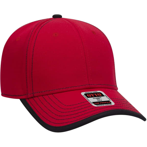 A red 6 panel low profile baseball cap with black accents and a logo on the side.