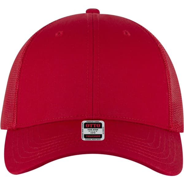 A red 6 panel low-profile trucker cap featuring a mesh back and a branded tag on the front.