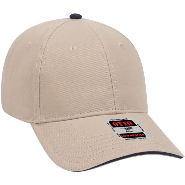 A beige six-panel low profile baseball cap with a contrasting navy underside and a logo.