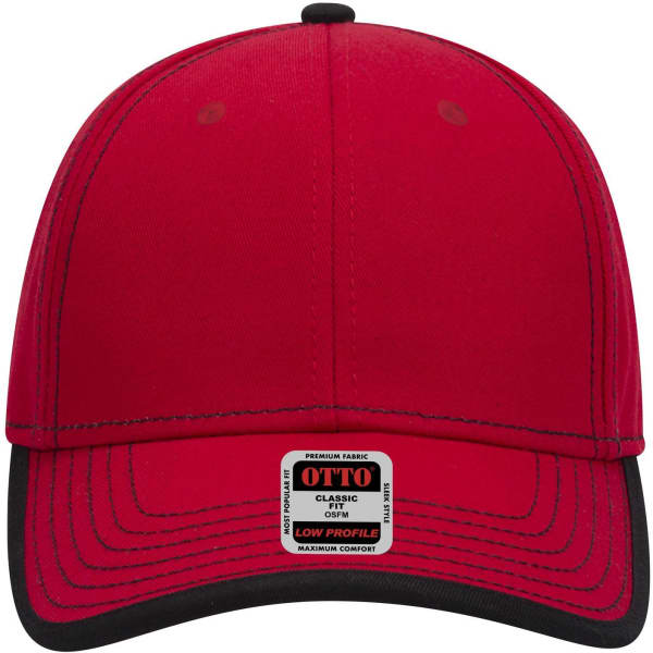 A red 6 panel low profile baseball cap with a black brim and a logo on the front.