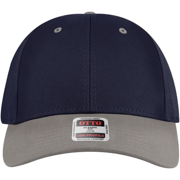 A navy and grey 6-panel low profile baseball cap with a logo on the front and ventilation eyelets.