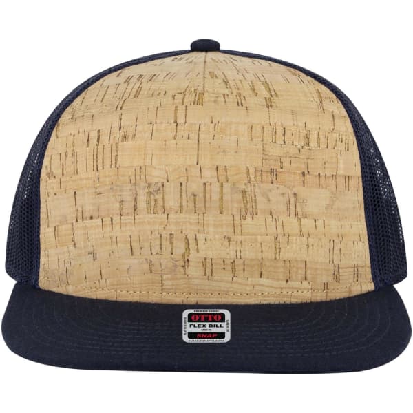 A 5-panel pro style trucker cap featuring a cork front and navy mesh sides. It has a logo on the front.
