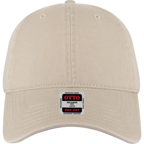 A beige 6-panel low profile dad cap featuring a logo on a badge at the front.